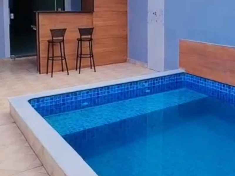 CASA GEMINADA COM PISCINA...JD.PALMEIRAS 700 MTS DA PRAIA